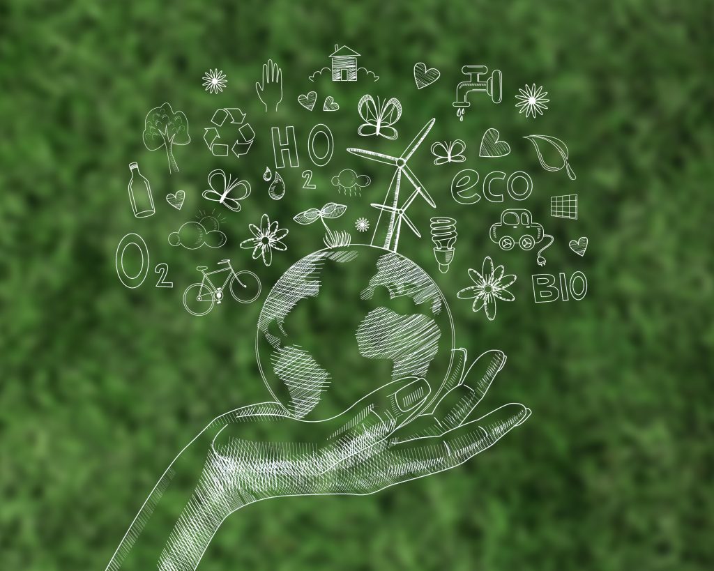 illustration of hand holding the world with renewable technology